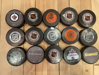 Vintage NHL Hockey Puck Collection – Lot of 15 Collectible Team Pucks (Mighty Ducks, Nordiques, Jets)