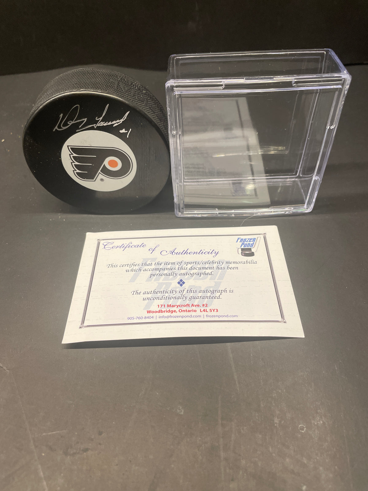 Vintage Doug Favell Autographed Philadelphia Flyers Hockey Puck (With COA; Case)