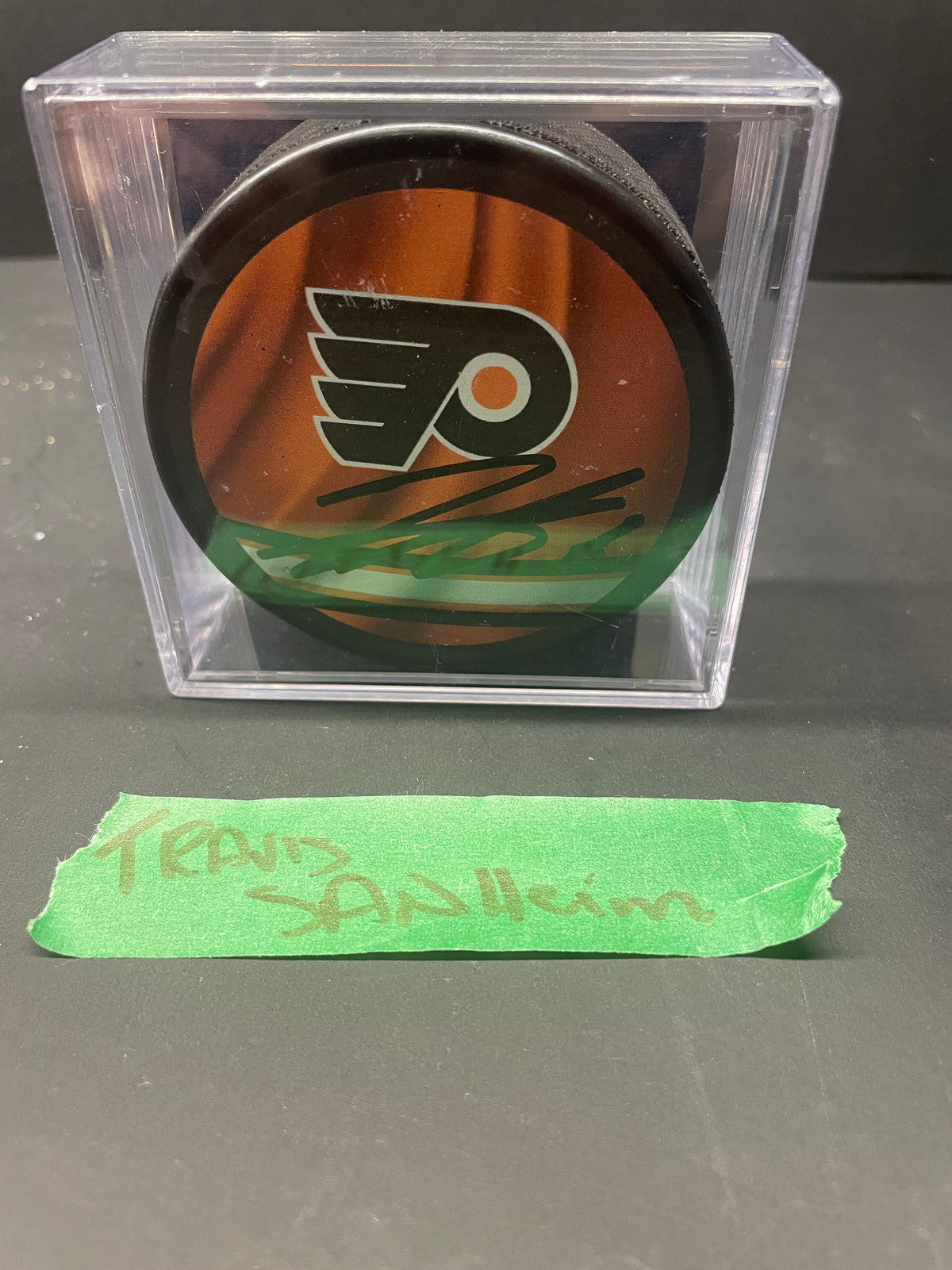 Travis Sanheim Autographed Philadelphia Flyers Hockey Puck (With COA; Display Case)